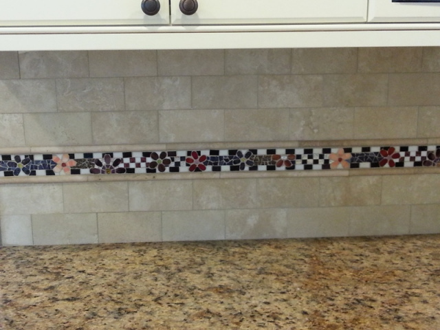A custom mosaic backsplash