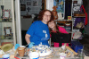 Mom and daughter are using supplies that they found during their travels
